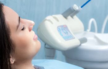 Woman Under Sedation at the Dentist Office